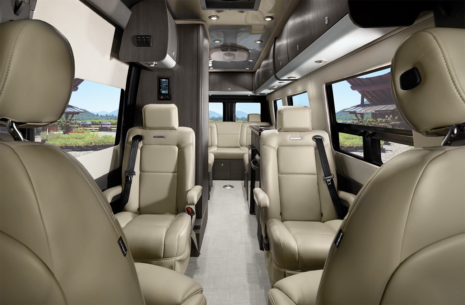 Lounge configuration — Modern Greige interior, captain's chairs facing aft